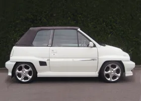 ホンダ シティ カブリオレ ターボ : サイドスカート装着（雨樋流用） 11